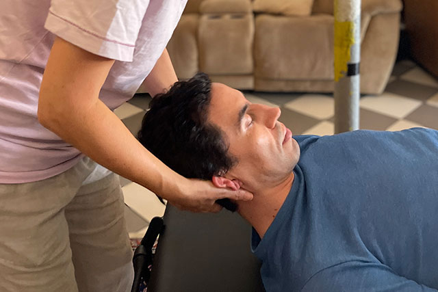 A male client receives acupressure for anxiety treatment at Barn Life Recovery